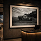 Bring the quiet beauty of rural America into your home with this striking black and white photograph of a weathered