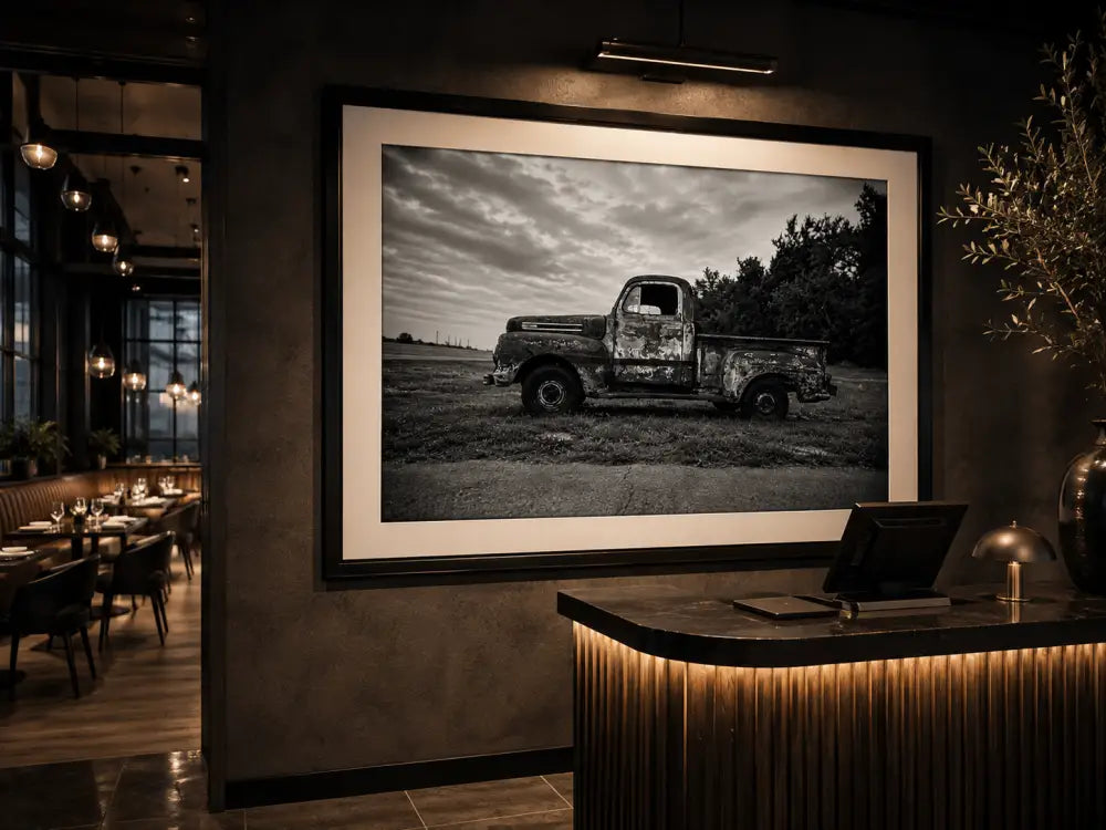 Bring the quiet beauty of rural America into your home with this striking black and white photograph of a weathered