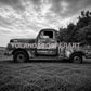 Bring the quiet beauty of rural America into your home with this striking black and white photograph of a weathered