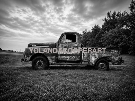 Bring the quiet beauty of rural America into your home with this striking black and white photograph of a weathered