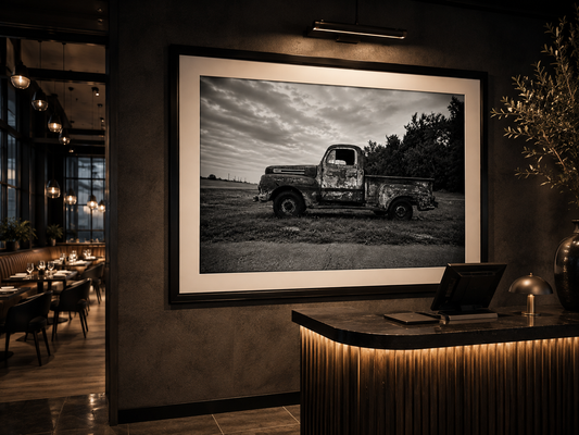 Bring the quiet beauty of rural America into your home with this striking black and white photograph of a weathered vintage farm truck resting beneath dramatic Texas skies. Rich in texture, history, and character, this fine art print celebrates the enduri